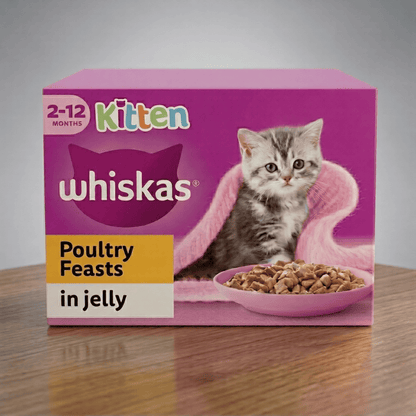 Whiskas Kitten Poultry Feasts in Jelly food packaging on a wooden surface