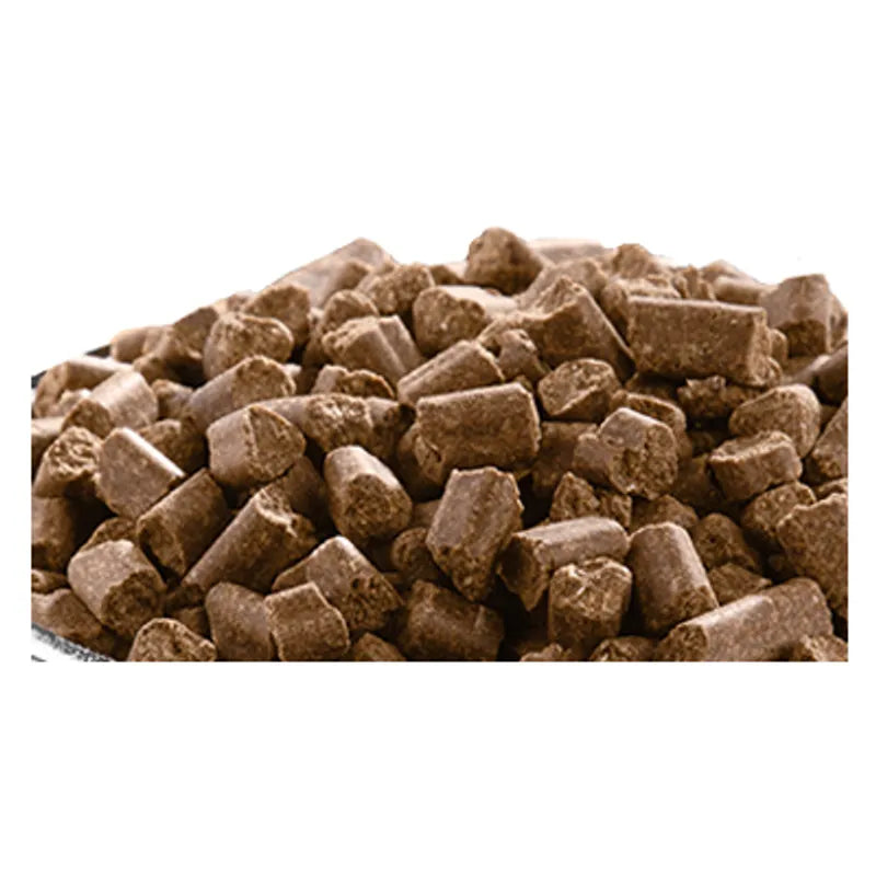 Brown pet food pellets on a white background