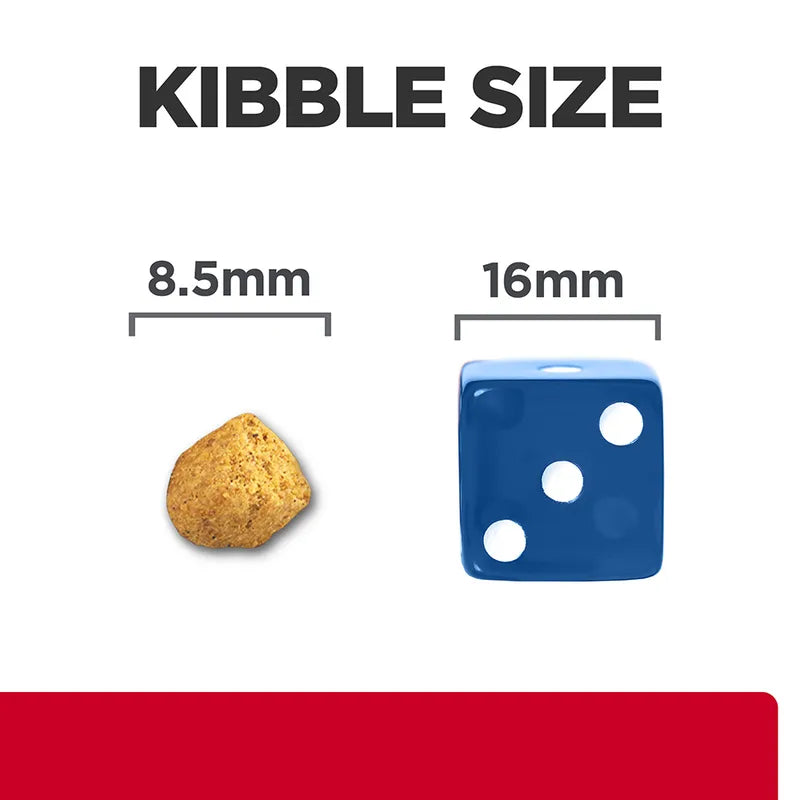 Comparison of kibble size to a blue die with text indicating 8.5mm and 16mm.