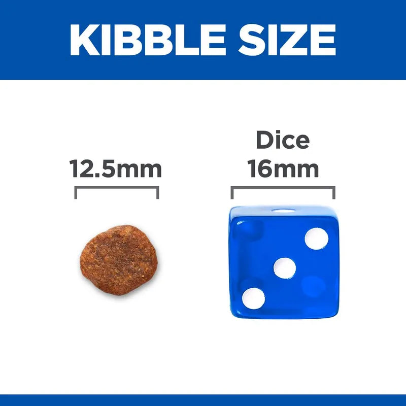 Comparison of kibble size to a dice showing 12.5mm and 16mm measurements.