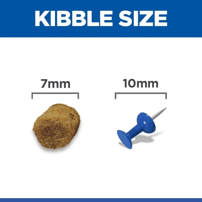 Comparison of kibble size to a 7mm and 10mm pin on a white background with blue border.